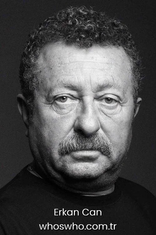 Black and white studio headshot portrait of veteran Turkish actor Erkan Can. 