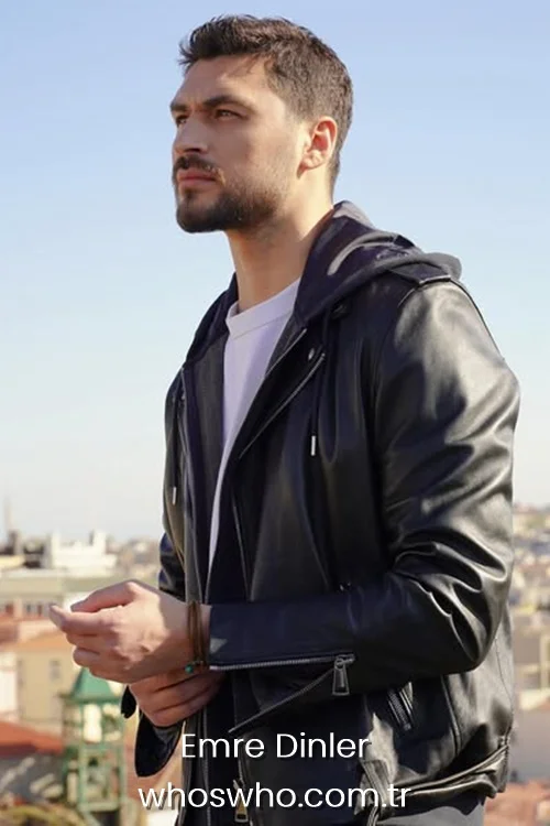 Emre Dinler in a side profile view wearing a black leather jacket with a hood outdoors.