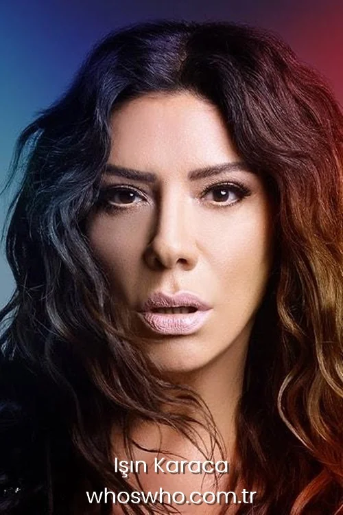 Close-up portrait of Turkish pop singer Işın Karaca with long wavy hair looking at the camera.