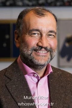 Murat Ülker weight Official biography cover portrait of Turkish businessman Murat Ülker smiling in a brown blazer and pink shirt.