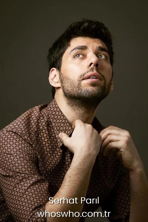 Turkish actor Serhat Parıl posing in a brown patterned shirt.