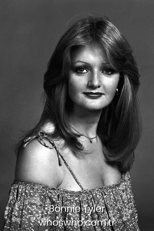 A vintage black and white portrait of young singer Bonnie Tyler during her early music career.