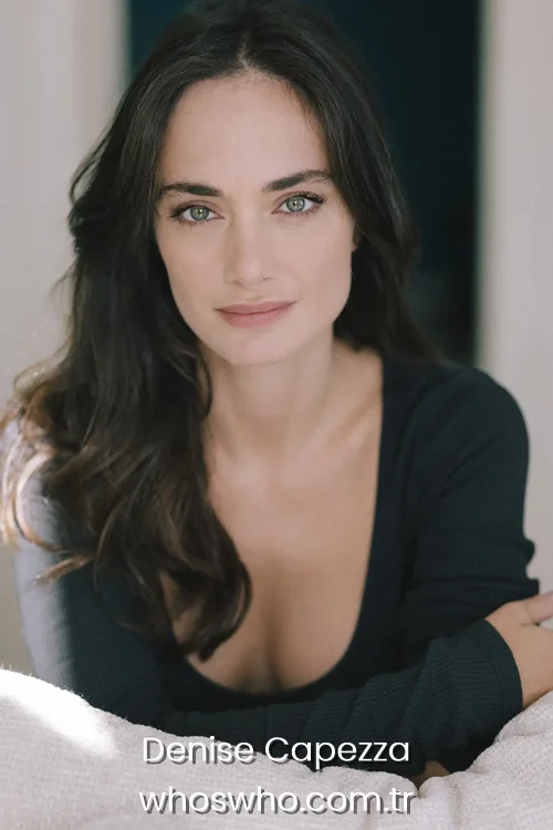 Italian actress Denise Capezza in a casual black long-sleeve shirt for a natural portrait.