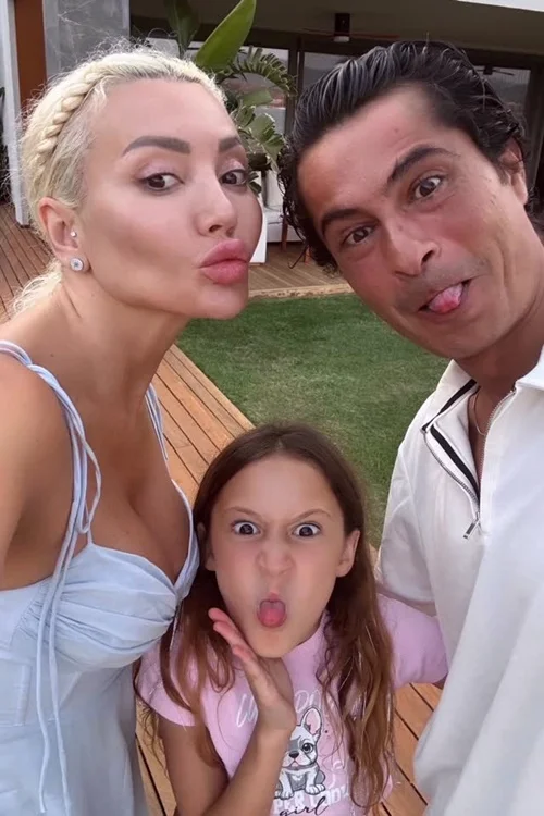 Turkish actor Ismail Hacioglu posing for a funny selfie with his wife Duygu Kaya Kumarki and their daughter Yemin during a family vacation 