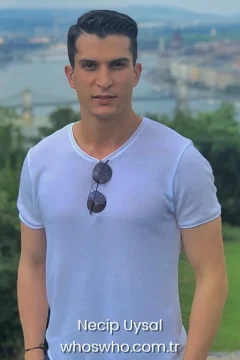 Turkish football player Necip Uysal portrait in a white t-shirt for his official biography profile cover.